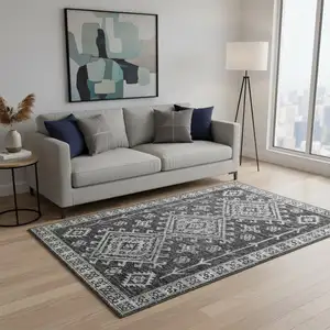 Photo of Graphite And Charcoal Geometric Washable Area Rug With UV Protection
