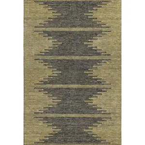 Photo of Graphite And Gold Abstract Washable Area Rug With UV Protection