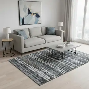 Photo of Graphite And Ivory Striped Washable Area Rug With UV Protection
