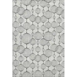 Photo of Graphite And Silver Geometric Washable Area Rug With UV Protection