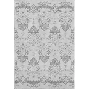 Photo of Graphite And Silver Medallion Washable Area Rug With UV Protection