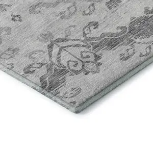 Photo of Graphite And Silver Medallion Washable Area Rug With UV Protection