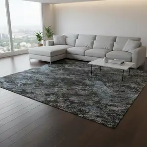 Photo of Graphite Blue And Copper Abstract Washable Area Rug With UV Protection