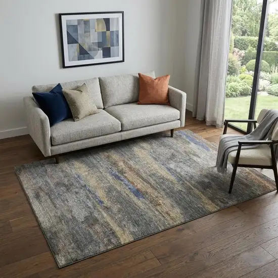 Graphite Gold And Blue Abstract Washable Area Rug With UV Protection Photo 1