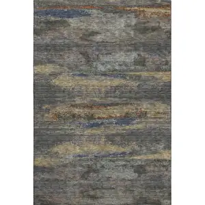 Photo of Graphite Gold And Blue Abstract Washable Area Rug With UV Protection