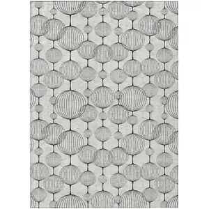 Photo of Graphite Gray And Silver Geometric Washable Indoor Outdoor Area Rug