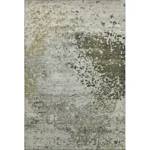 Photo of Graphite Green And Ivory Abstract Washable Area Rug With UV Protection