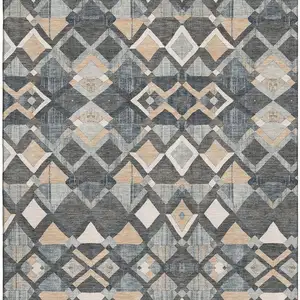 Photo of Graphite Peach And Ivory Geometric Washable Area Rug With UV Protection