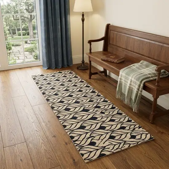 2' X 6' Graphite and Tan Abstract Leaves Washable Runner Rug Photo 1