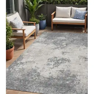 Photo of Gray And Beige Abstract Washable Indoor Outdoor Area Rug
