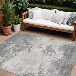 Photo of Gray And Beige Abstract Washable Indoor Outdoor Area Rug