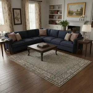 Photo of Gray And Beige Diamond Area Rug With Fringe