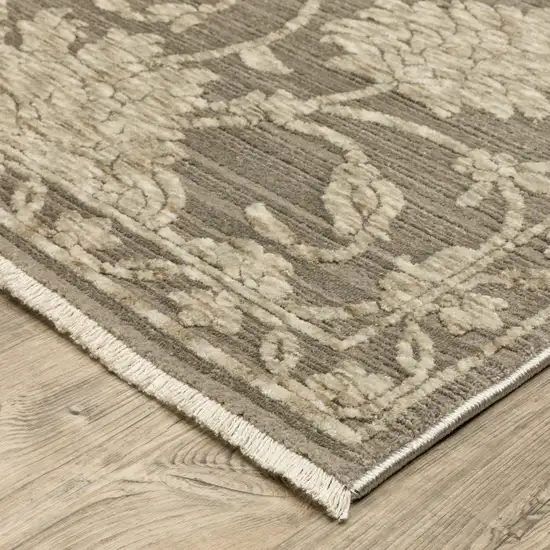 Gray And Beige Floral Area Rug With Fringe Photo 7