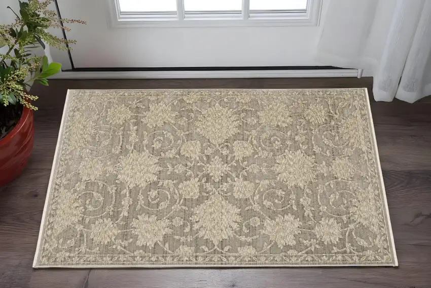 Gray And Beige Floral Area Rug With Fringe Photo 1