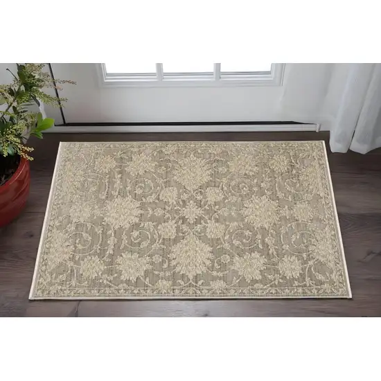 Gray And Beige Floral Area Rug With Fringe Photo 1