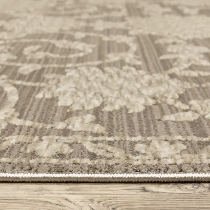 Gray And Beige Floral Area Rug With Fringe Photo 8