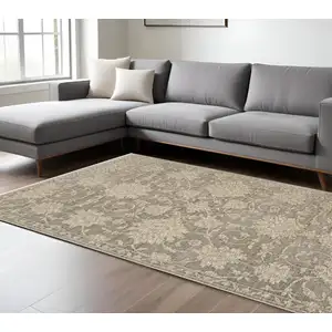 Photo of Gray And Beige Floral Area Rug With Fringe