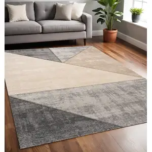 Photo of Gray And Beige Geometric Area Rug