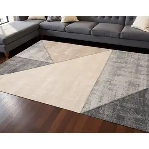 Photo of Gray And Beige Geometric Area Rug