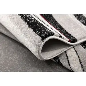 Photo of Gray And Black Abstract Area Rug