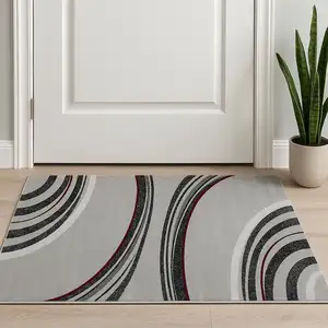 Photo of Gray And Black Abstract Area Rug