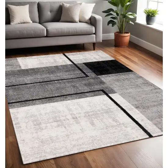 Gray And Black Abstract Area Rug Photo 1