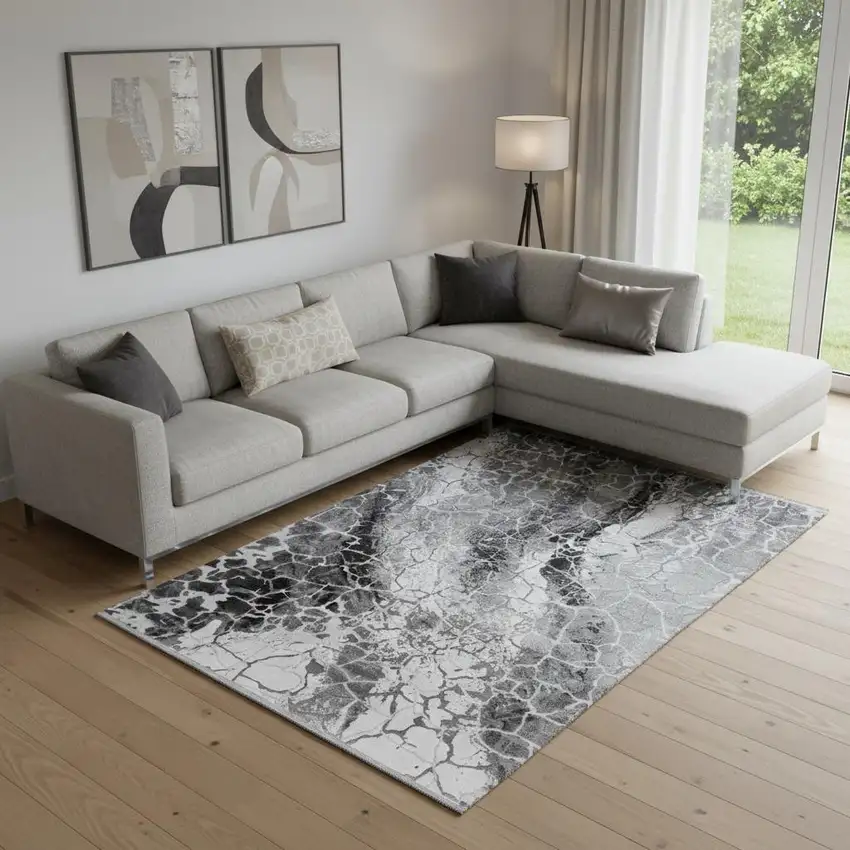 Black And Gray Abstract Area Rug With Fringe Photo 1