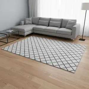 Photo of Gray And Black Geometric Washable Area Rug With UV Protection