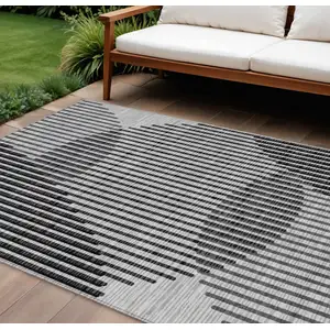 Photo of Gray And Black Geometric Washable Indoor Outdoor Area Rug