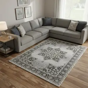 Photo of Gray And Black Medallion Area Rug With Fringe
