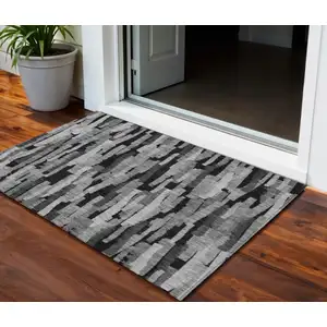 Photo of Gray And Black Striped Washable Indoor Outdoor Area Rug
