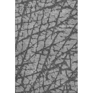 Photo of Gray And Charcoal Abstract Washable Area Rug With UV Protection