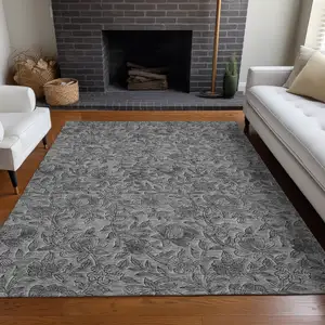 Photo of Gray And Charcoal Floral Washable Area Rug With UV Protection