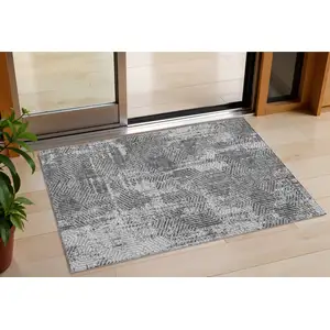 Photo of Gray And Charcoal Geometric Washable Indoor Outdoor Area Rug