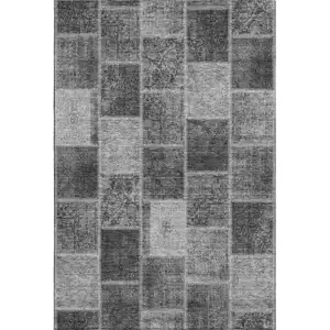 Photo of Gray And Charcoal Patchwork Washable Area Rug With UV Protection