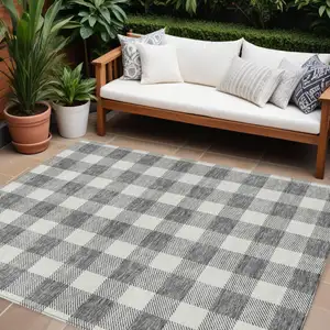 Photo of Gray And Charcoal Plaid Washable Indoor Outdoor Area Rug