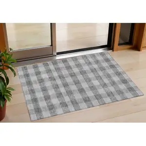 Photo of Gray And Charcoal Plaid Washable Indoor Outdoor Area Rug