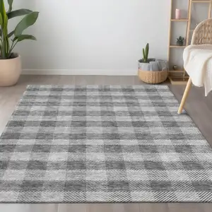 Photo of Gray And Charcoal Plaid Washable Indoor Outdoor Area Rug