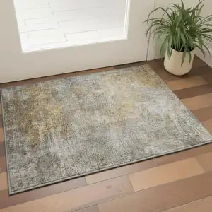 Photo of Gray And Copper Abstract Washable Area Rug With UV Protection