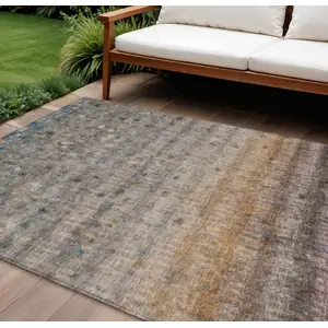 Photo of Gray And Copper Striped Washable Indoor Outdoor Area Rug