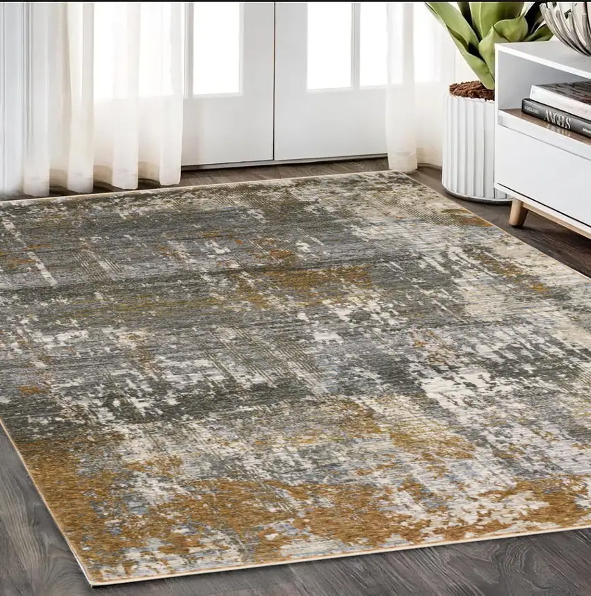 Gray And Gold Abstract Area Rug With Fringe Photo 1