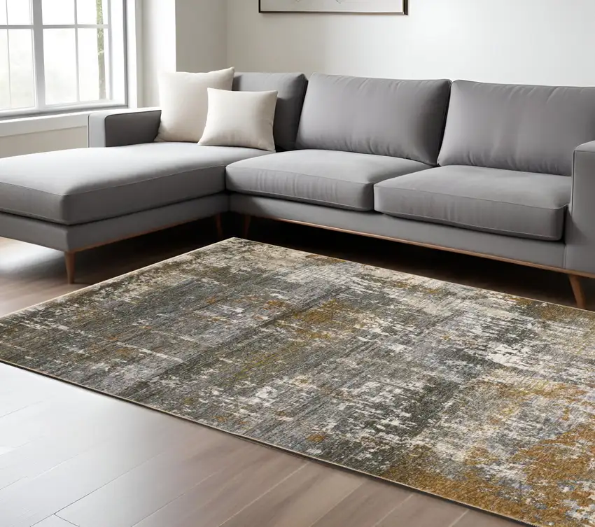 Gray And Gold Abstract Area Rug With Fringe Photo 1
