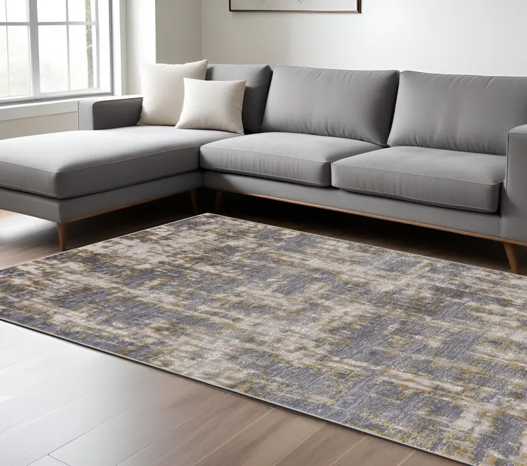 Gray And Gold Abstract Stain Resistant Area Rug Photo 1