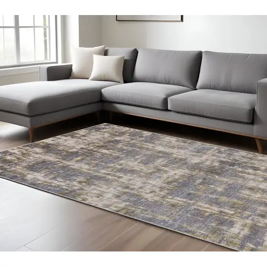 Gray And Gold Abstract Area Rug Photo 1