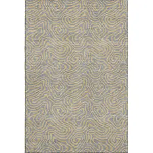 Photo of Gray And Gold Abstract Washable Area Rug With UV Protection