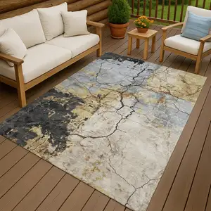 Photo of Gray And Gold Abstract Washable Indoor Outdoor Area Rug