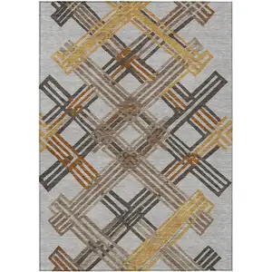 Photo of Gray And Gold Geometric Washable Indoor Outdoor Area Rug