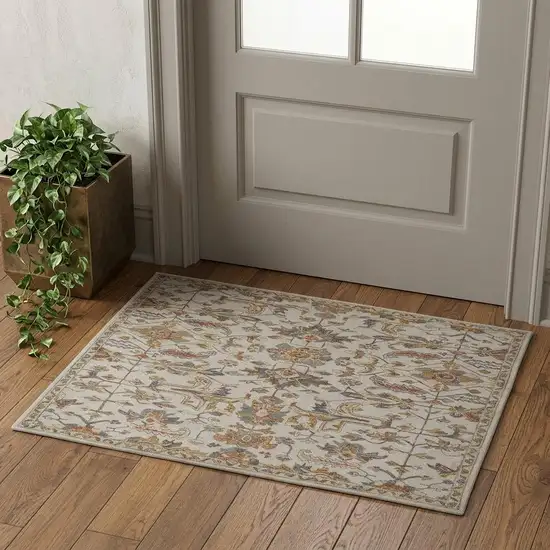 Gray And Gold Wool Floral Tufted Handmade Stain Resistant Area Rug Photo 1