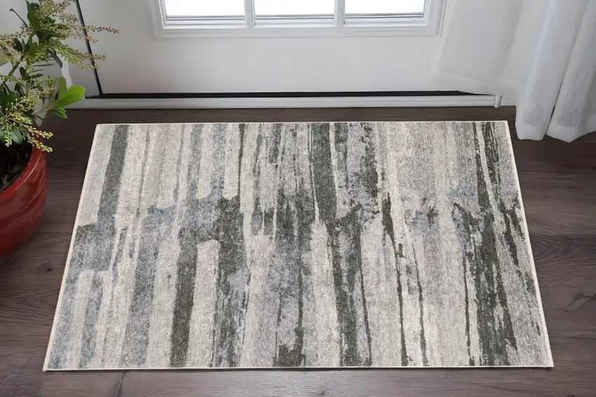 Gray And Ivory Abstract Area Rug With Fringe Photo 1