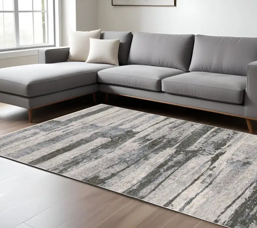 Gray And Ivory Abstract Area Rug With Fringe Photo 1